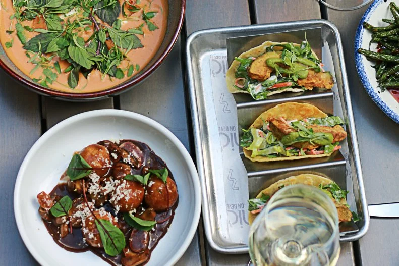 The founder of Eat Drink Vegan and culinary director for Coachella (and other festivals), Nic Adler is a well-known figure in the vegan and larger food community. Since opening his eponymous restaurant in Beverly Grove earlier this year, he’s been making a name for himself as a serious restaurateur. The all-day place serves a wide selection of plant-based fare, ranging from a fried green tomato sandwich and wood-fired Detroit-style pizza to tempura avocado tacos and Thai red curry. With great food and an impressive beverage program, it’s easy to see why its cozy back patio is always buzzing with adoring fans.