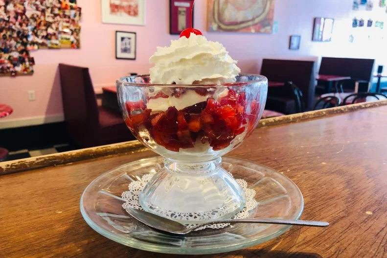 You could go the typical sundae route at this NOLA ice cream shop, but when in southern Lousiana, indulge as you can nowhere else. The Creole Strawberry Sundae is made with Creole cream cheese ice cream, an old-school New Orleans flavor made with farmer cheese, which has a texture somewhere between cottage cheese and creme fraiche. The sundae here is topped with fresh Louisiana strawberries, whipped cream and a cherry. It's a true taste of the city.