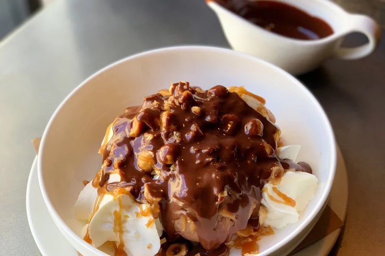 Steakhouses are often home to incredible desserts, and the newest addition to the BLT family is no exception. Indulge in a big steak, but save room for the salted caramel sundae, made with both vanilla and dark chocolate ice cream, topped with a hazelnut potato chip crumble, drizzled with caramel and topped with hot fudge. It will satisfy all your sweet and salty cravings.