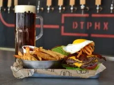 This nationally recognized, <a target="_blank" href="https://www.azwbeer.com/">Gilbert-based craft brewery</a> recently expanded to Downtown Phoenix, bringing with them their delicious Arizona grass-raised beef burger and duck-fat French fries to pair with the Arizona-centric beers. Grab a spot on the patio to enjoy a burger and brew while watching the buzz of Roosevelt Row. 