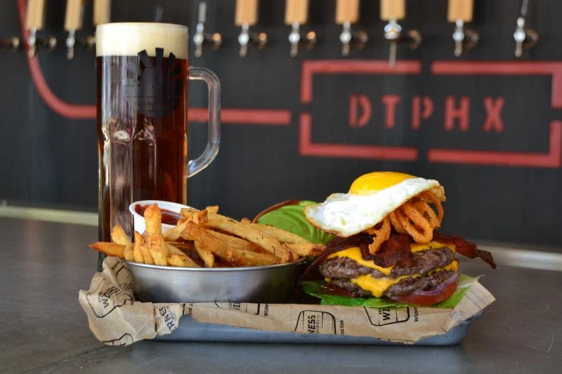 This nationally recognized, <a target="_blank" href="https://www.azwbeer.com/">Gilbert-based craft brewery</a> recently expanded to Downtown Phoenix, bringing with them their delicious Arizona grass-raised beef burger and duck-fat French fries to pair with the Arizona-centric beers. Grab a spot on the patio to enjoy a burger and brew while watching the buzz of Roosevelt Row. 