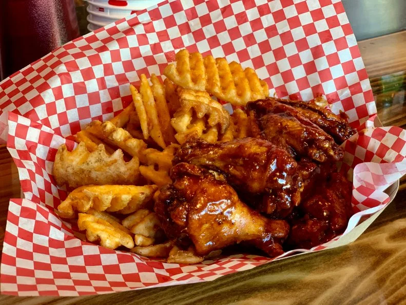 Pitmaster Phil “The Grill” Johnson has won awards and competed on Chopped Grill Masters, but now he runs a fantastic, small smokehouse on Roosevelt Row. He serves up the best burnt ends in town (the charred tips of a smoked brisket) and house-smokes pastrami for Reubens. <a target="_blank" href="https://trapphausbbq.com/">Trapp Haus’</a> super-saucy Philly Crack Wings and Phil ‘Em Up Fries (seasoned waffle fries covered in cheese sauce, BBQ sauce, and pico) are two destination-worthy musts.