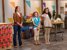 Host Alyson Hannigan with Girl Scouts Domenica Giammona and Olivia Altidor, as seen on Girl Scout Cookie Championship, Season 1.