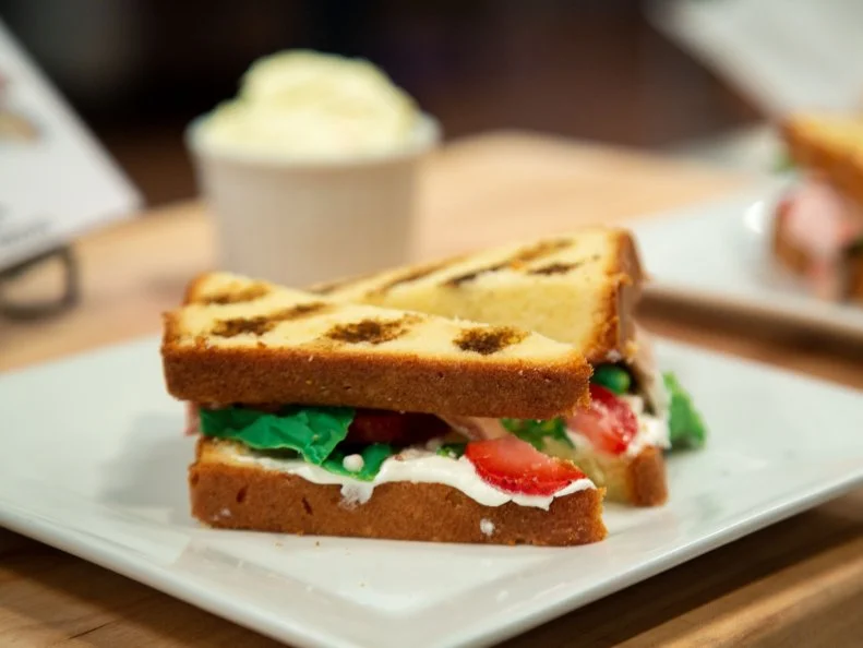 Graysen's final dish - BLT on White Bread, Twist: Potato Salad - CREAM CHEESE POUNDCAKE BREAD, CANDIED STRAWBERRY TOMATOES, HOMEMADE FONDANT BACON, COATING CHOCOLATE LETTUCE, SWISS MERINGUE BUTTERCREAM MAYO WITH CAKE POP POTATOES, STRAWBERRIES & COATING CHOCOLATE POTATO SALAD, as seen on Kids Baking Championship, Season 8.