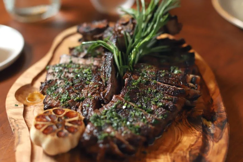 A longtime favorite from the namesake Austrian celebrity chef, <a target="_blank" href="http://wolfgangpuck.com/dining/orlando-bar-grill/">Wolfgang Puck Bar & Grill</a> got a super-spiffy refresh in 2019 to evoke a California farm house. The menu showcases Puck classics, like the once-trendy Chinois chicken salad and the iconic chicken Wienerschnitzel. Newer dishes have a Golden Gate influence, like a heritage pork chop cooked on a wood-burning grill, and enhanced by peach chutney; a flat-iron steak with chimichurri; and a red snapper with mango-corn salsa. The pizza? Excellent, every time. Craft cocktails are front and center. Need more energy for that next trip to the Magic Kingdom? Gulp down the Classic Affogato. It’s vanilla gelato with a double shot of espresso. If all you need is a sweet fix, stroll to the outside gelato bar where you might cool off with a creamy dark cheery chocolate chunk, or butter pecan panna cotta, Italian-style ice cream.
