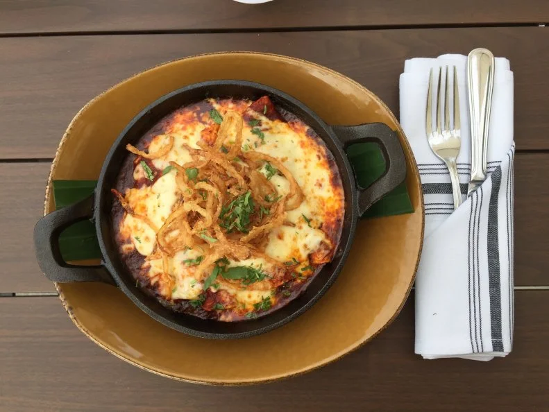 Seven-time James Beard Award winner Rick Bayless is not just any purveyor of south-of-the-border meals. Instead, he takes classics flavors and transforms them for the Disney Springs crowd dining at his <a target="_blank" href="http://www.fronteracocina.com/">Frontera Cocina</a>, with mixologists on staff and a menu dedicated to the Yucatan Peninsula. Try a plant-based cauliflower-squash casserole with smoky morita chile sauce, or chipotle chicken snuggled within enchiladas under a deep red guajillo chile sauce. Or, for a coastal flavor, maybe achiote-grilled octopus, or spicy herb-covered grilled bass. Margaritas are practically a must — you have seven to choose from — although that mezcal negroni, and the old fashioned made with heritage blue-corn whiskey, also beckon.