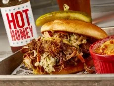 Get a taste of local food at <a target="_blank" href="https://politepig.com/">The Polite Pig</a>, where Orlando chefs James, Julie and Brian Petrakis serve smoked meats plated in modern ways. You’ll order, say, the Southern Pig sandwich at the counter, and wait for the pulled pork meal topped with fennel-apple slaw, mustard barbecue sauce and mayo to be brought to your table. Begin with the oversized hop salt pretzel with beer cheese fondue and IPA mustard, and add on the grilled street corn with chipotle aioli. It’ll be easy to relax because Polite Pig is big on spirits, too. It pours the company’s own Swine Family beers, big-batch cocktails like apple-cider whiskey sours, and dozens of types of bourbon. P.S. Don’t worry about getting back in line to order seconds; servers are happy to take your second and third orders right from your seat.