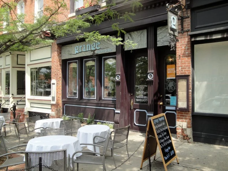 This <a target="_blank" href="https://www.grangekitchenandbar.com/">farm-to-table restaurant</a> lets the food speak for itself with a minimalist design – exposed brick decorated only with photos of local farms. It’s not unusual to see chefs breaking down animals or hauling in produce from nearby farms. The menu changes regularly with choices like dates with housemade chorizo and blue cheese; brussels sprout cacio e pepe; and grilled Michigan rainbow trout.