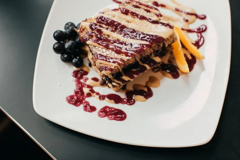 Housed in the historic Staebler Family Oil Company filling station, this 100% vegan restaurant has a destination patio and fabulous weekly live music. From from the folks behind The Lunchroom restaurant, <a target="_blank" href="https://thelunchrooma2.com/detroit-street-filling-station-1">Detroit Street Filling Station</a> is perhaps best at brunch, when maple-whiskey-glazed apple fritters and house made biscuits with an onion-sage gravy lure big crowds. The friendly, welcoming owners aren’t proprietary with their recipes — they will gladly share their recipes with fans to recreate at home.