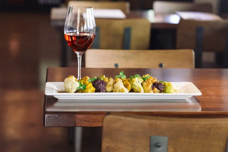 Arizona winemaking (yes, it's a thing) has made great strides over the last few years. Even Maynard James Keenan of Tool is a player on the AZ grape-growing stage, with his Merkin Vineyards and Caduceus Cellars. Keenan and crew recently opened <a target="_blank" href="https://merkinvineyardsosteria.com/">a tasting room and restaurant</a> in the heart of Old Town with a menu of wine-friendly food like cheese and charcuterie, salads and dishes that showcase local meat, veggie and bread purveyors.