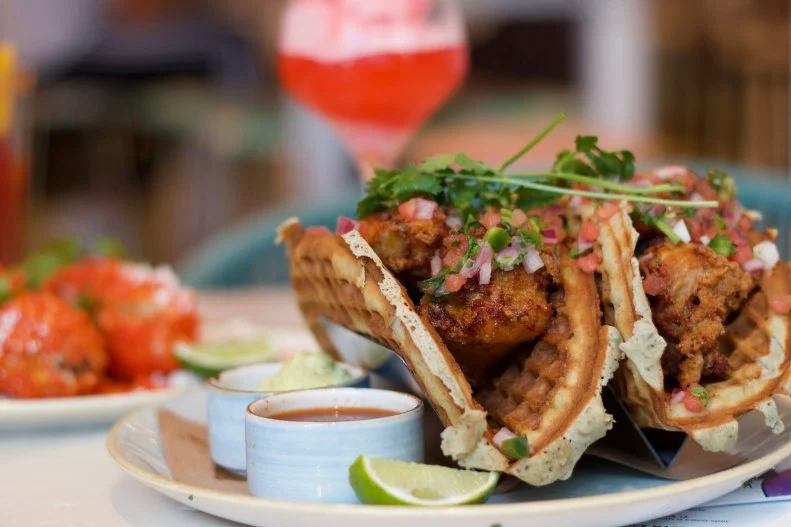 Despite Boston’s northern locale, there is no shortage of chicken and waffles around town, but <a target="_blank" href="https://www.citrusandsaltboston.com/">Citrus & Salt</a>, a “coastal Mexican” restaurant owned by Chef Jason Santos, serves one of the more unusual versions around. Fried chicken is paired with Santos’ blue corn and tequila waffles, along with spicy agave syrup, avocado butter and watermelon pico de gallo. Other options include the Brunch Chimichanga, with scrambled eggs, broken rice, poblano queso, salsa and home fries and Chilaquiles Rojo, with sunny-side up eggs, goat cheese and crème fraîche. Make sure to order a soft serve mimosa or a Dole Whip with aged rum for a brunch to remember.