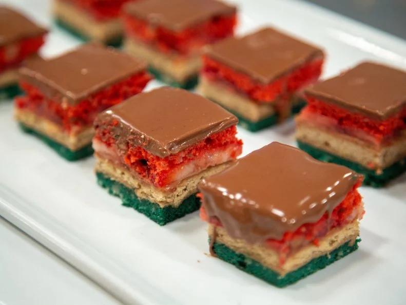 Reggie's final dish - INGREDIENT: HAZELNUT,HAZELNUT RAINBOW COOKIE WITH HAZELNUT & GIANDUJA BUTTER AND FRESH STRAWBERRIES, COVERED WITH GIANDUJA,WITH PROSCIUTTO TWO-CHEESE PIZZA BITE TWIST, as seen on Kids Baking Championship, Season 8.