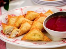 Jeff Mauro puts his spin on the restaurant favorite, Crab Rangoon, with an addictive sweet and sour sauce made with pineapple juice, ketchup, rice wine vinegar and maraschino cherry juice.