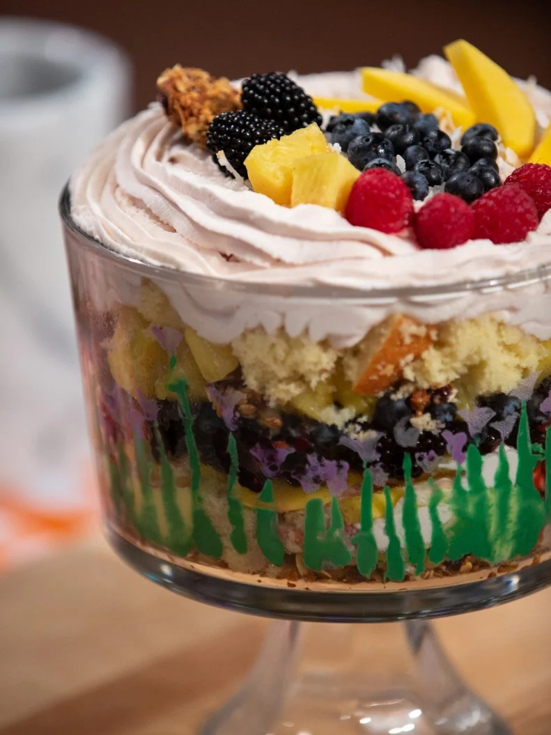 Morgan's final dish - VANILLA CAKE WITH A HINT OF LEMON, COCONUT VANILLA PASTRY CREAM, AND CARAMELIZED PINEAPPLES, TOPPED WITH STRAWBERRY WHIPPED CREAM,WITH GRANOLA WITH MANGOS & MIXED BERRIES, as seen on Kids Baking Championship, Season 8.