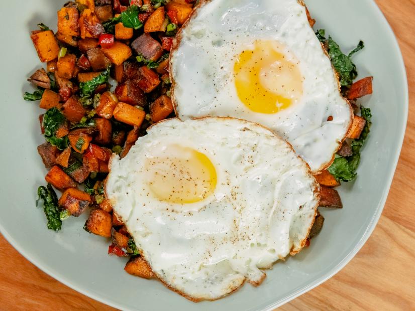 Michael Symon features Sweet Potato and Kale Hash with Fried Eggs, as seen on Food Network Kitchen Live.