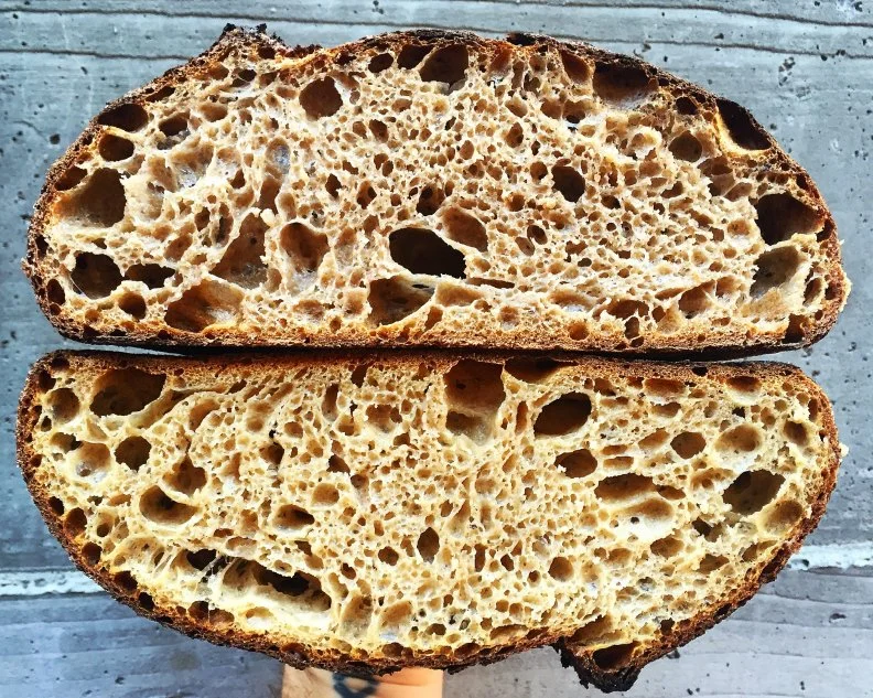 What’s in a name? Well, if you’re Josey Baker, your destiny — Baker is the baker-owner of <a target="_blank" href="http://www.joseybakerbread.com/">Josey Baker Bread</a>, a San Francisco bakery he opened in 2010. Though Baker has indeed always loved baking, his devotion to grain sourcing and freshly milled flour took root thanks to another well-named individual, Dave Miller, a miller considered by many the godfather of grains. Baker added a mill to his operation in 2013 and today, mills around 400 pounds of flour daily on his New American Stone mill, including red and white wheat, rye, corn, and oats, and occasionally buckwheat and millet. All loaves are crafted with the same sourdough culture Baker got from his great-great-grandmother. Try the Red, White and Rye loaf, an aptly named and balanced whole grain sourdough that boasts a smooth and creamy crumb that’s still got plenty of heft. All loaves benefit from what Baker describes as a bold bake, which shows off a crackly, caramelized crust speckled with char and a supple, moist interior. If you don’t think whole-grain bread is your thing, the Wonder Bread, a fluffy 100% whole-grain sourdough pan loaf, will change your mind. 