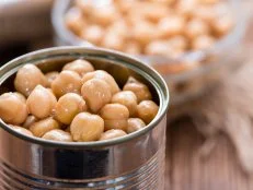 Portion of preserved Chick Peas (close-up shot)