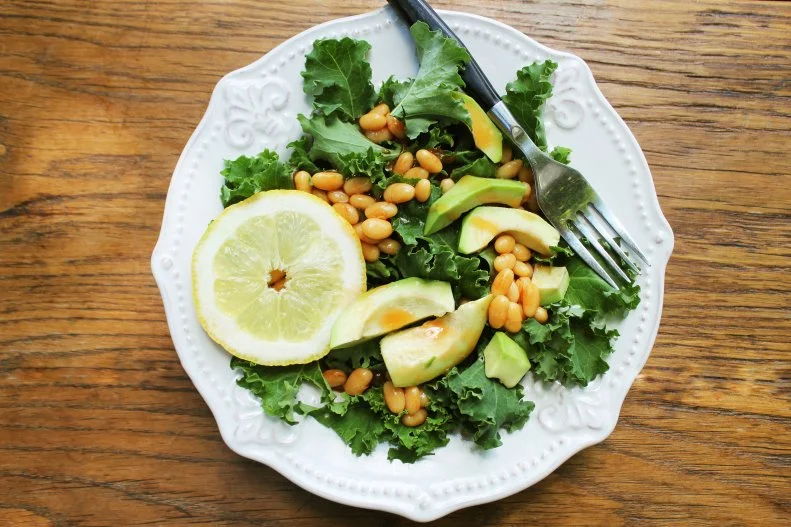 “My favorite work-from-home lunch takes me 5 minutes to prep, is bursting with flavor and loaded with fiber, micronutrients, healthy fats and plant-based protein,” says registered dietitian nutritionist, <a target="_blank" href="https://www.malinamalkani.com/">Malina Malkani</a>, MS, RDN, CDN, media spokesperson for the <a target="_blank" href="https://www.eatright.org/">Academy of Nutrition and Dietetics</a> and creator of Solve Picky Eating. “ I love that it’s so nutrient-dense and keeps me full and energized for hours.” Malkani takes two stalks of kale, removes the stems, drizzles on a little olive oil and massage it quickly, then chop and add a large tomato, 1 shallot, ½ an avocado and 1 cup of canned cannellini beans that have been rinsed and drained. Toss with some lemon juice and salt and it’s good to go!”