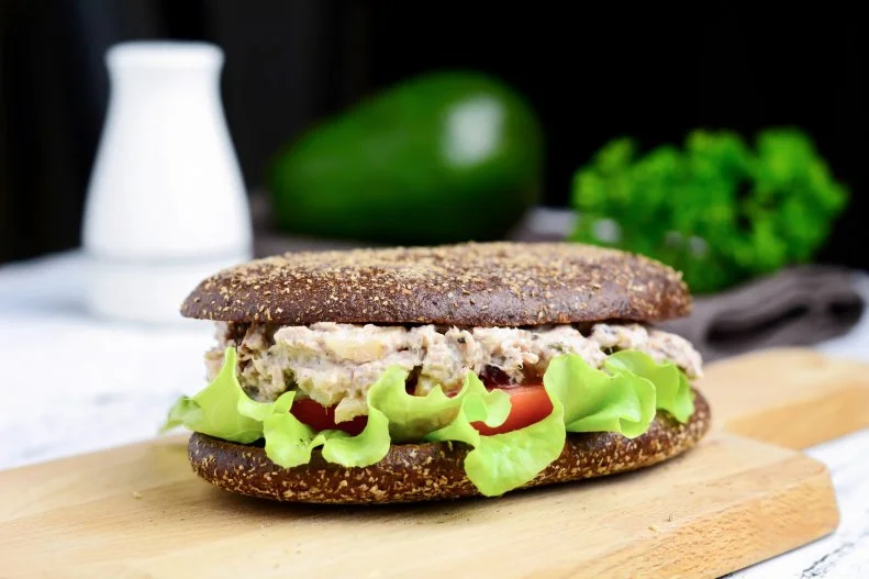Elizabeth Ward, MS, RDN of <a target="_blank" href="https://betteristhenewperfect.com/">Better is the New Perfect</a> keeps it simple with a tuna fish sandwich on whole grain bread with tomato and a piece of fruit. “I've been working from home for more than 20 years, and I always take time out to eat lunch. I love this meal because it's delicious, and it's packed with protein, fiber, and beneficial omega-3 fats,” says Ward. “It's energizing and filling and it often keeps my mind off food while I'm working during the afternoon.”