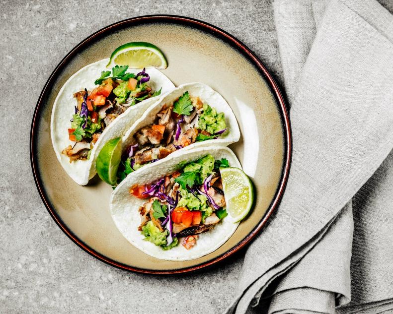 “I typically make simple tacos for lunch a few times a week,” says <a target="_blank" href="https://www.momskitchenhandbook.com/">Katie Sullivan Morford, MS, RD</a>, author of <a target="_blank" href="https://www.amazon.com/Prep-Essential-Katie-Sullivan-Morford/dp/1611806100">PREP: The Essential College Cookbook</a>. “I top corn tortillas with grated cheddar and get those crispy along the bottom in a hot skillet. Then I add whatever vegetables I have, such as cooked broccoli or sautéed kale, along with black beans or an egg, plus avocado, salsa, and pickled cabbage or jalapeños. They're super nourishing and delicious!”