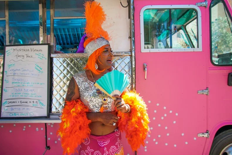 Mystikka Masala herself makes an appearance to drum up customers in Las Vegas on the second day of selling on The Great Food Truck Race Season 12, as seen on Food Network.