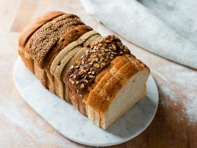 https://food.fnr.sndimg.com/content/dam/images/food/fullset/2020/05/15/fn_bread-loaf-multiple-kinds-getty_s4x3.jpg.rend.hgtvcom.406.305.suffix/1589826666407.jpeg