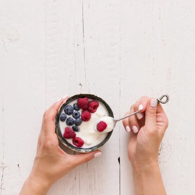 Spoonfuls of protein, calcium and tummy-pleasing probiotics, yogurt is an ideal snack option. 
Greek yogurt is higher in protein and lower in lactose, while traditional yogurt is fortified with vitamin D – check ingredient labels to find the best for your diet.