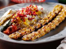 <p>Head 20 minutes outside Oklahoma City to Travel by Taste to sample the international flavors that Iranian-born Parviz Rezaian and his wife grew up with. Diners love the crunchy samosas with tamarind sauce and the fragrant chicken kebabs over saffron rice.</p>