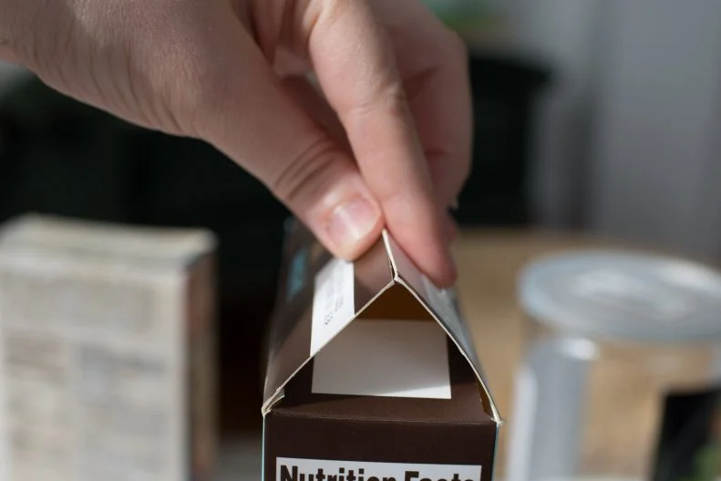 Start with clean, empty containers. Using your tape, seal the boxes or containers closed if necessary. On some boxes, if they have flaps on top, you can tape them together to form a roof. 