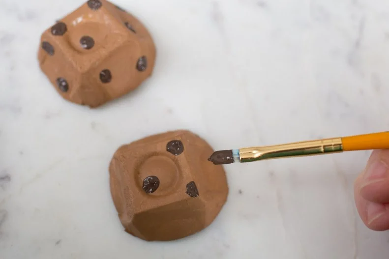Add the chips with a darker shade of brown paint (or let kids color on rainbow sprinkles).