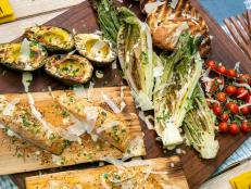 The base of this fully loaded Caesar salad is an easy dressing made with pantry staples. Then we amp up the flavor by grilling all the components, adding a delicate smokiness. If you've never used cedar planks for salmon, here is your chance. We're pretty sure you'll never go back to the hassle of fish sticking to the grill grates again.