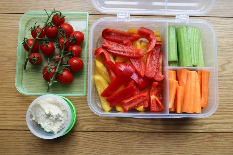 This super satisfying snack makes for healthy munching any time of day. Dippable vegetables like cucumbers, carrots and pepper strips can be prepped ahead of time and stored in resealable bags or reusable containers. To avoid spreading germs, pack up single serve hummus cups or you can also spread hummus in the bottom small containers and pile the veg on top to make dipping even easier.