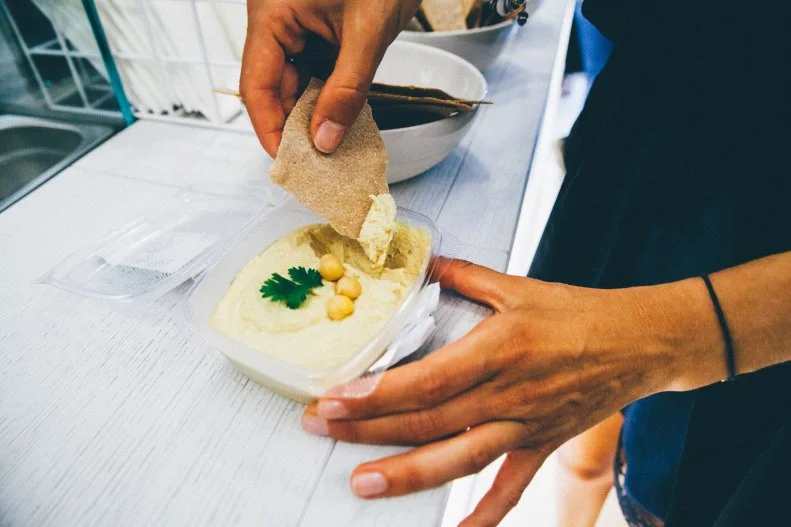 Culinary nutritionist <a target="_blank" href="https://www.jackietopol.com/">Jackie Topol, MS, RD</a> went on an RV trip a couple summers ago and she had a teeny fridge so had to stock it carefully.  She opted for hummus because it is “packed with both protein and fiber, and a perfect snack with veggies and whole grain crackers or can be spread on a sandwich for a plant-powered lunch.” Topol says that you can even thin it with water and lemon juice for a quick and easy salad dressing. It’s all about versatility. 