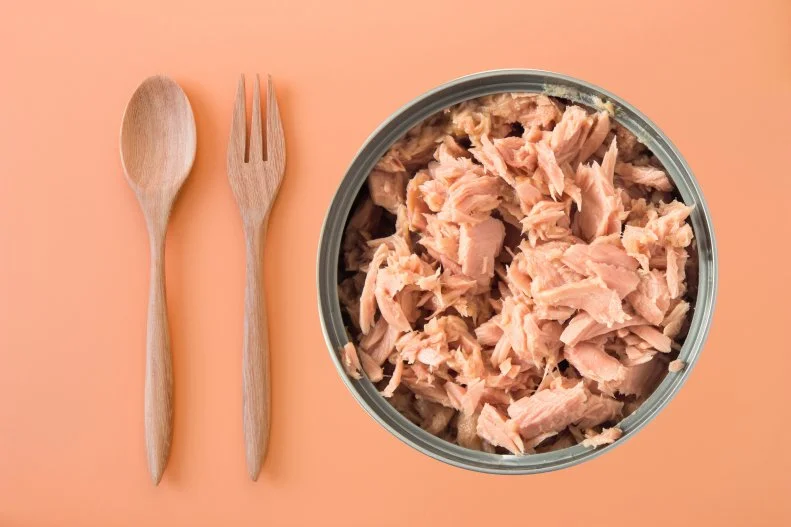 Bonnie Taub-Dix, RDN, creator of <a target="_blank" href="http://betterthandieting.com/">BetterThanDieting.com</a>, author of <a target="_blank" href="https://www.amazon.com/Read-Before-You-Eat-Taking/dp/1979739722/ref=sr_1_1?s=books&ie=UTF8&qid=1513656967&sr=1-1&keywords=read+it+before+you+eat+it">Read It Before You Eat It - Taking You from Label to Table</a> recommends packing canned fish, like tuna or salmon, for your road trip. 
“Besides being easy to store, canned tuna and salmon provide excellent sources of protein and omega-3 fatty acids,” says Taub-Dix. “Plus, fish is also like the chameleon of the meal — it can appear at breakfast, lunch or dinner.” Taub-Dix recommends eating it cold by adding some mayo or mashed avocado or making salmon patties by adding a few simple ingredients. 
Canned fish is also low in calories and kind on your wallet — be sure to look for sales and stock up before you go on the road.
