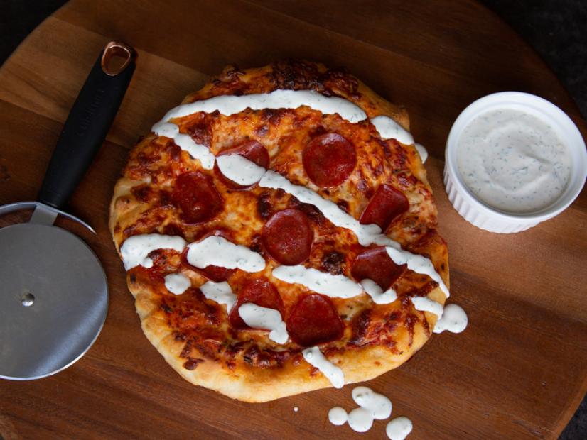 Hosts Adeev and Ezra Potash's cast iron skillet pizza with homemade ranch, as seen on Takeout Twins, season 1.