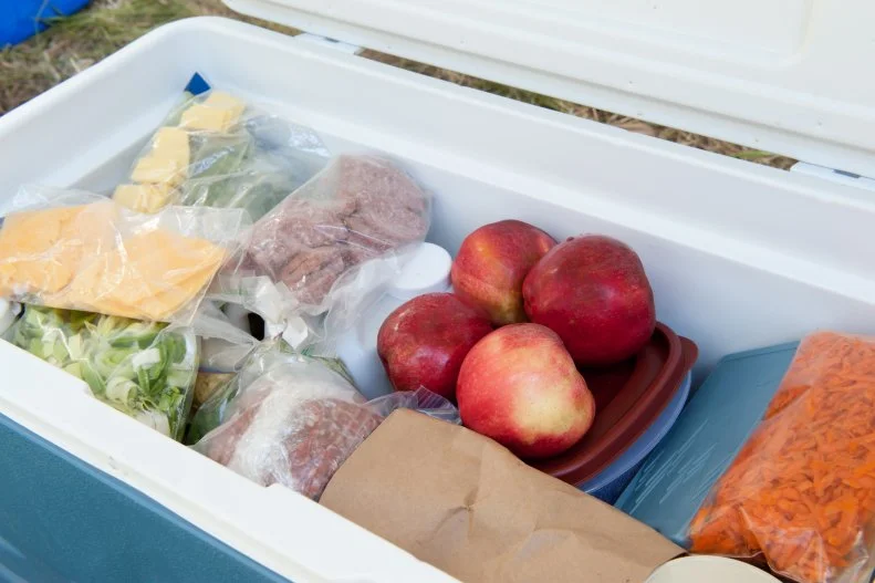 You always want to keep hot food hot and cold food cold. As you won’t have a heat source, your best bet is to bring chilled foods. Refrigerate or freeze the food overnight. To keep foods cold, bring frozen gel-packs or freeze some box drinks and water bottles. A few foods that can are good for camping and can be kept cold include sandwiches, bread and cheese, or salads.