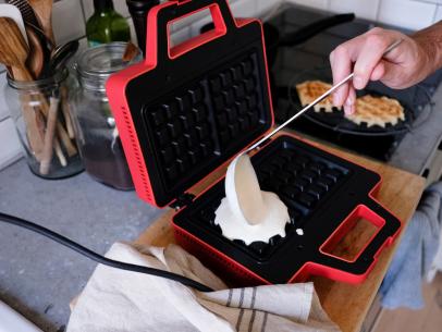 https://food.fnr.sndimg.com/content/dam/images/food/fullset/2020/09/03/ladling-waffle-batter-into-waffle-maker.jpg.rend.hgtvcom.406.305.suffix/1599158254943.jpeg