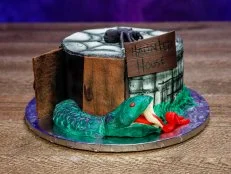 Contestant Renee Loranger, CHOCOLATE CHERRY STOUT CAKE W/ CHERRY BALSAMIC FILLING AND AMERICAN BUTTERCREAM, SNAKE (FONDANT), DOOR CHOCOLATE WAFER COOKIE, as seen on Halloween Baking Championship, Season 6.