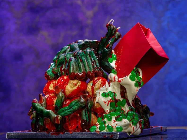Contestant Aaron Clouse LIME CANDY/ZOMBIES .PATE A CHOUX W/ KEY LIME FILLING, COVERED IN PUMPKIN MARSHMALLOW, PATE A CHOUX ZOMBIE FINGERS FENCE, as seen on Halloween Baking Championship, Season 6.