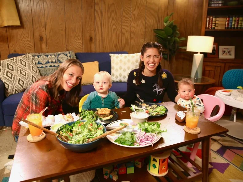 Molly Yeh and her sister-in-law pose together with their chlidren, as seen on Girl Meets Farm, Season 5.