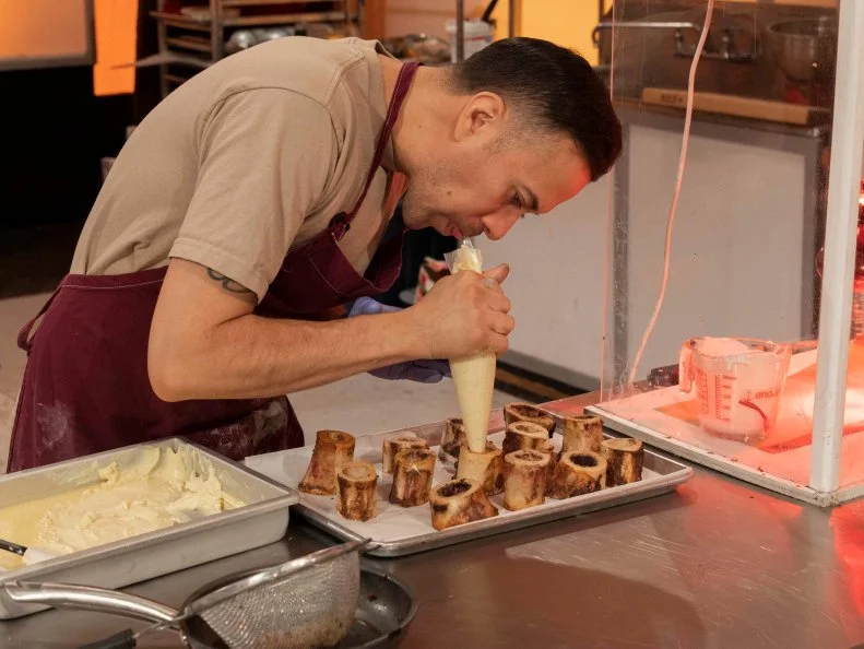 Team Crave Diggers Sugar Expert Joel Gonzales ceates marrow bones pastries during Episode 4 Spine Chiller challenge "Trapped with a monster", as seen on Halloween Wars, Season 10.