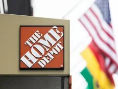Home Depot Inc. signage is displayed outside a store in New York, U.S., on Sunday, Aug. 16, 2020. Home Depot is scheduled to release earnings figures on August 18. Photographer: Jeenah Moon/Bloomberg via Getty Images