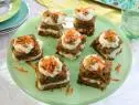 Miss Kardea Brown's Carrot Cake with shredded apples, golden raisins, pineapples & walnuts topped with cream, as seen on Delicious Miss Brown, Season 3.
