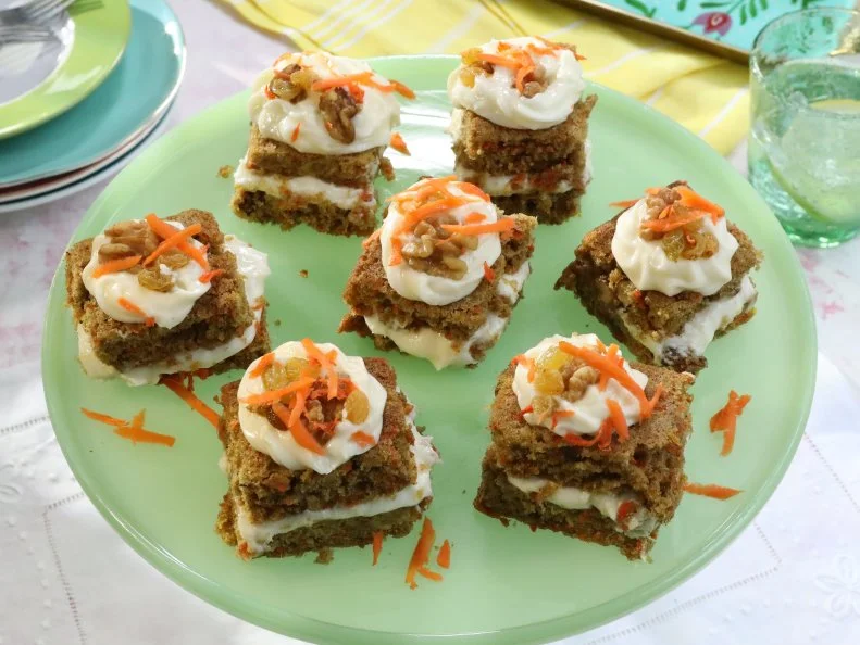 Miss Kardea Brown's Carrot Cake with shredded apples, golden raisins, pineapples & walnuts topped with cream, as seen on Delicious Miss Brown, Season 3.
