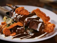 <p>Momocho's modern Mexican cuisine is fresh-to-order, meaning they've ditched the walk-in freezers and heat lamps. Guy paid a visit for the guacamole served six different ways (think goat cheese, crab and pineapple). But regulars love the machaca, a tender coffee and chile braised beef brisket.</p>