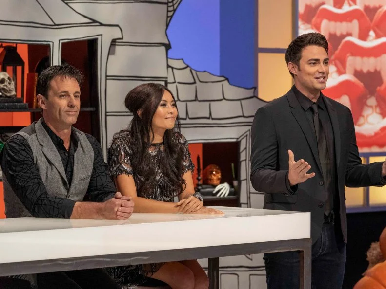 Left to Right: judges Todd Tucker and Shinmin Li, and host Jonathan Bennett during the judging of Episode 5 Small Scare challenge "Giant Bugs Attack!" as seen on Halloween Wars, Season 10.
