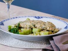 The beloved flavor pairing of salmon and mustard gets an elegant twist with the addition of white wine and butter. Baked low and slow until meltingly tender, the fish is served with a crisp fall salad of wine-soaked dates, apple and cucumber tossed in a light mustardy vinaigrette.