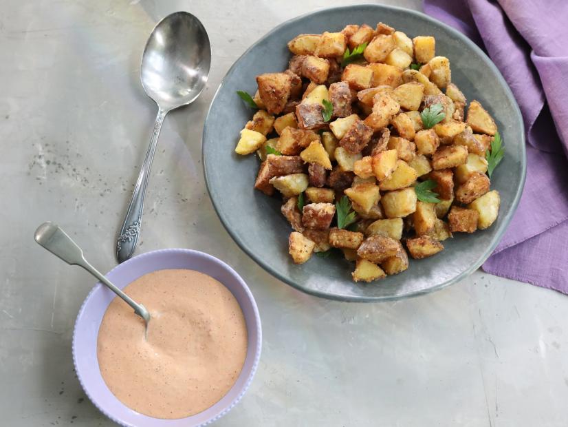 Miss Kardea Brown's Crispy Home Fries topped with a pimiento aioli, as seen on Delicious Miss Brown, Season 3.