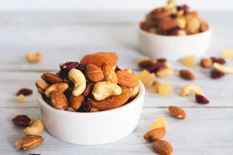 Nuts like almonds provide healthy monounsaturated fat and fiber to help stave off hunger. They’re also packed with nutrition and shockingly some nuts actually have fewer calories than once thought. <a target="_blank" href="https://pubmed.ncbi.nlm.nih.gov/27713968/">A 2016 study</a> from the United States Department of Agriculture (USDA) found that in whole unroasted almonds offer 19% fewer calories and chopped roasted almonds provide 17% fewer calories compared to the number of calories listed on the label.  