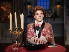 Zac in costume at judges table, as seen on Halloween Baking Championship, Season 6.